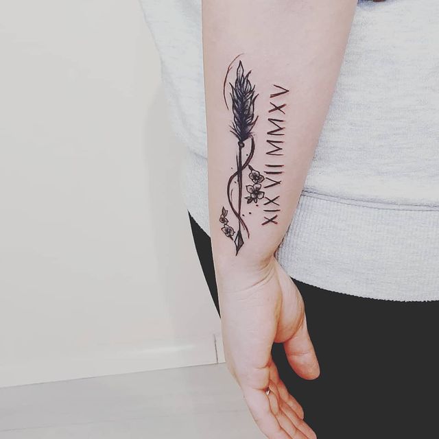 gorgeous single arrow tattoo on the arm